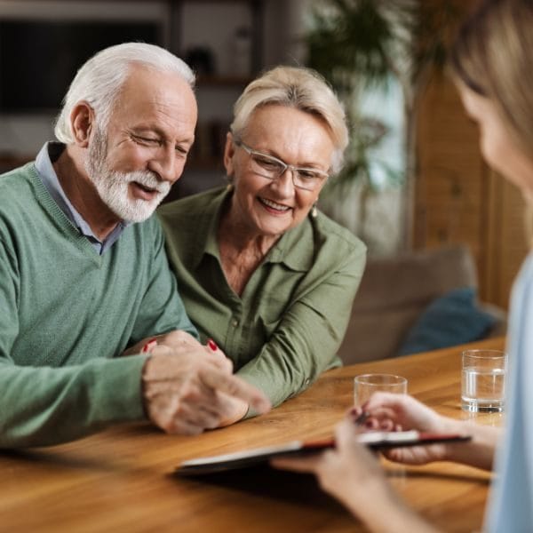 couple talking to financial advisor